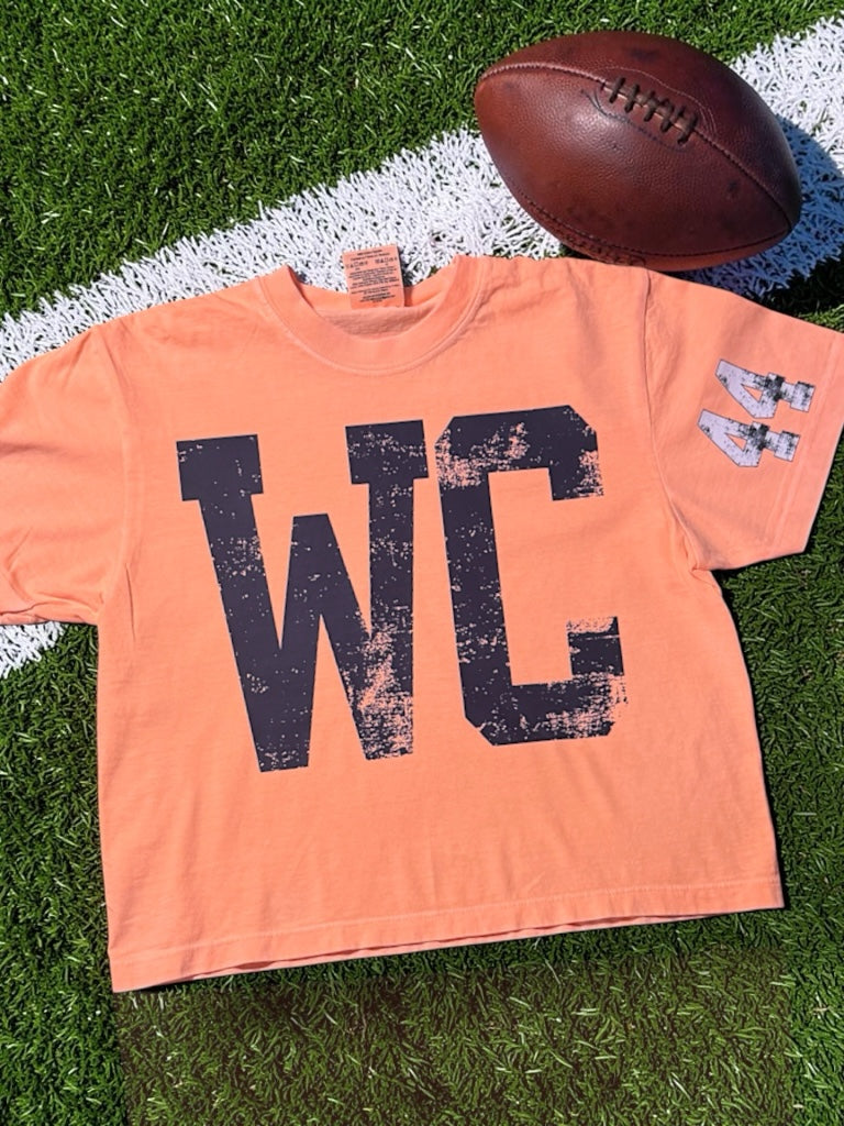Posh & Personalized 39367 peach cotton crop top with distressed black WC lettering and number 44 on the sleeve.